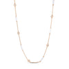 Rose gold necklace with alternating white enamel bar and diamond bezel stations on a white background