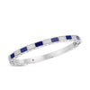 The Roberto Coin ART DECO MOSAIC ALTERNATING BLUE LAPIS AND DIAMOND BANGLE features a silver band adorned with alternating square blue lapis and diamond gemstones in a sleek Art Deco style.