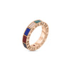 The ART DECO MOSAIC MIXED STONES RING by Roberto Coin features a rose gold design with rectangular red, blue, green, and black stone inlays, accented by sparkling white diamonds. Shown on a white background.