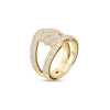 The CIALOMA DIAMOND SINGLE KNOT PAVE RING by Roberto Coin is an 18K yellow gold ring with an intricate knot design, pavé diamonds, and a small red gemstone on the inner band, shown against a white background.