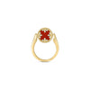 The VENETIAN MEDALLIONS SMALL REVERSIBLE RING by Roberto Coin features 18K yellow gold, a central round red gemstone, diamond-like accents, and leaf motifs. It is elegantly displayed on a plain white background.