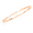 The Roberto Coin DESIGNER GOLD CLASSIC OVAL BANGLE is a thin, classic oval bracelet in polished 18K rose gold with a pink gemstone set into the band, displayed on white—an elegant luxury jewelry piece.