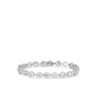 The Roberto Coin DOLCETTO ALTERNATING THREE STONE DIAMOND BRACELET in 18K gold showcases alternating circular and marquise-shaped links with sparkling diamond accents, elegantly displayed on a plain white background.