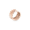 The DOMINO DIAMOND ACCENT WIDE RING by Roberto Coin is a modern 18K rose gold band with a spiral design, featuring cylindrical segments and vertical diamond accents, shown on a white background.