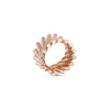 The DOMINO PAVE WIDE RING by Roberto Coin in 18K rose gold showcases a spiral of cylindrical segments, some adorned with pavé-set diamonds, displayed against a plain white background.