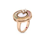 The LOVE IN VERONA RAINBOW DISC RING by Roberto Coin features a round mother-of-pearl center, rainbow gemstones, diamond accents, and a rose gold band with a pink gemstone embedded on the side.