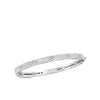 White gold bangle bracelet with diamonds on a white background