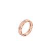 The LOVE IN VERONA NARROW DIAMOND ACCENT RING by Roberto Coin features delicate diamond-accented flower motifs and a round pink gemstone in rose 18K gold, displayed against a plain white background.