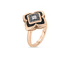 The Roberto Coin PALAZZO DUCALE CARNIVAL Flower Ring showcases black enamel, black and white diamonds in a quatrefoil design, beautifully crafted in 18K rose gold.