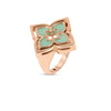The Roberto Coin VENETIAN PRINCESS PIROUETTE MEDIUM FLOWER RING in rose gold showcases a four-petal flower with soft green enamel inlays and smooth edges, elegantly displayed on a white background.