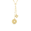 Gold necklace with a flower pendant and medallion pendant on a white background