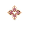 The gold lotus-shaped pendant with pink enamel and central floral cutout pairs beautifully with the VENETIAN PRINCESS PIROUETTE MEDIUM FLOWER RING by Roberto Coin for an elegant, coordinated look.