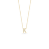 The Roberto Coin TINY TREASURES DIAMOND LOVE LETTER NECKLACE features an 18K gold chain with a diamond-encrusted letter K pendant, shown against a white background.